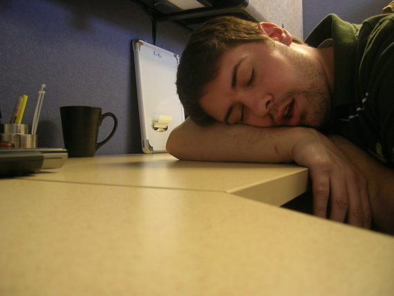Picture of man napping at work