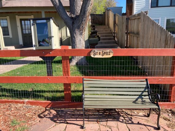 One of two benches we placed in front of our backyard fence for anyone who just wants to "sit a spell" and enjoy the view, or perhaps read a book from our Little Free Library. Many people use these benches every day.